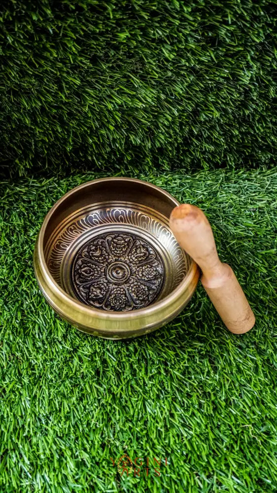 The 8 Auspicious Symbols Singing Bowl features traditional Tibetan symbols inside and the Om Mani Padme Hum mantra outside. Its soothing, uplifting sound brings blessings, harmony, and spiritual calm. Ideal for meditation, sound healing, or adding positive energy to your home or sacred space.