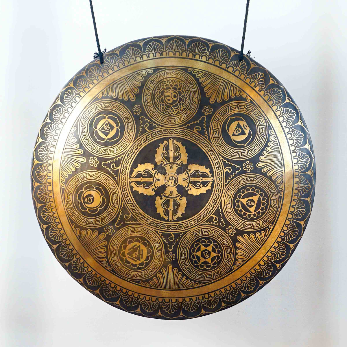 Ashtamangala gong featuring the Eight Auspicious Symbols with detailed golden Buddhist artwork and traditional Nepalese craftsmanship