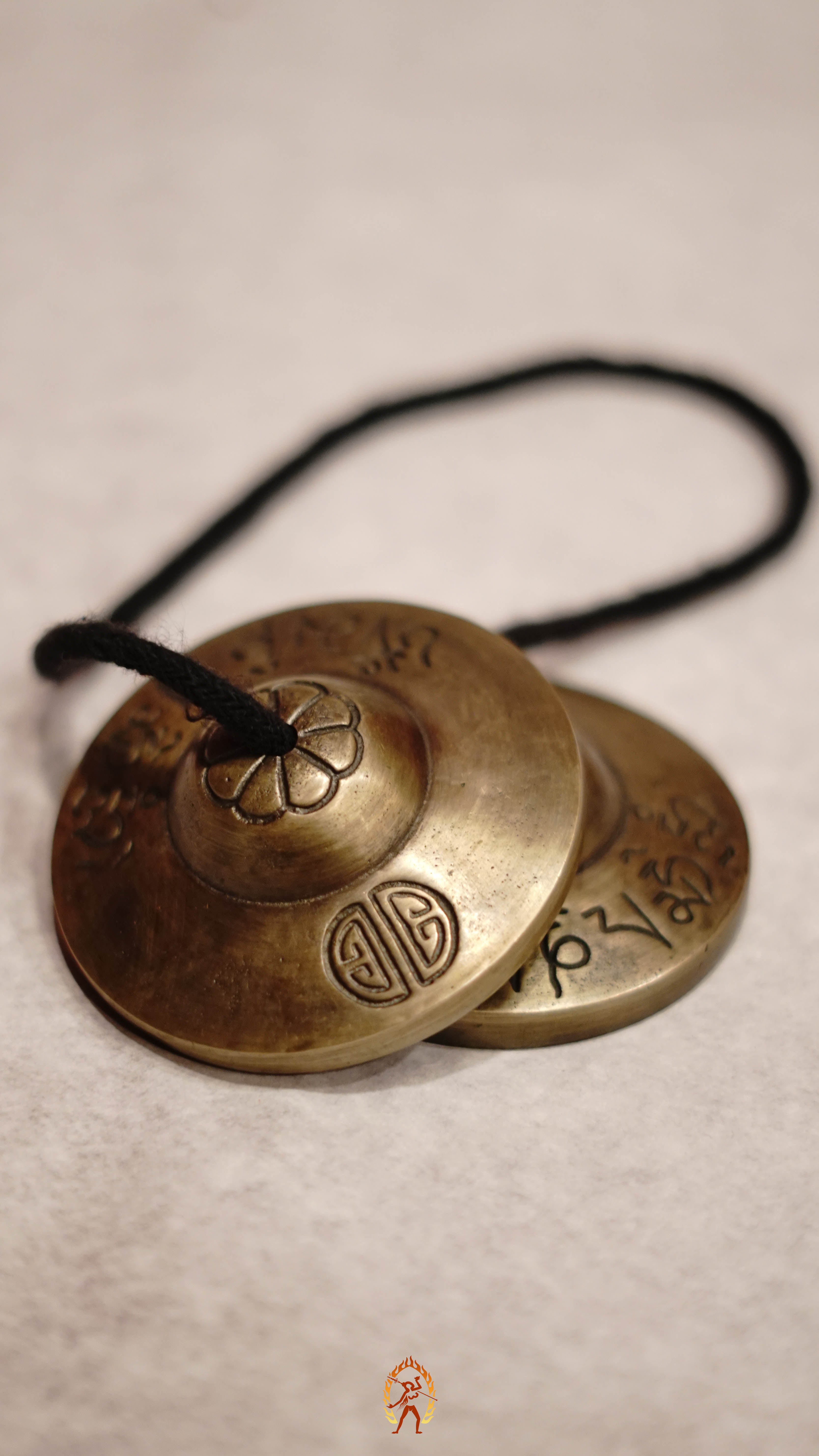 Traditional Tingsha Bell crafted in Nepal with a peaceful resonance to support your meditation and cleansing rituals.