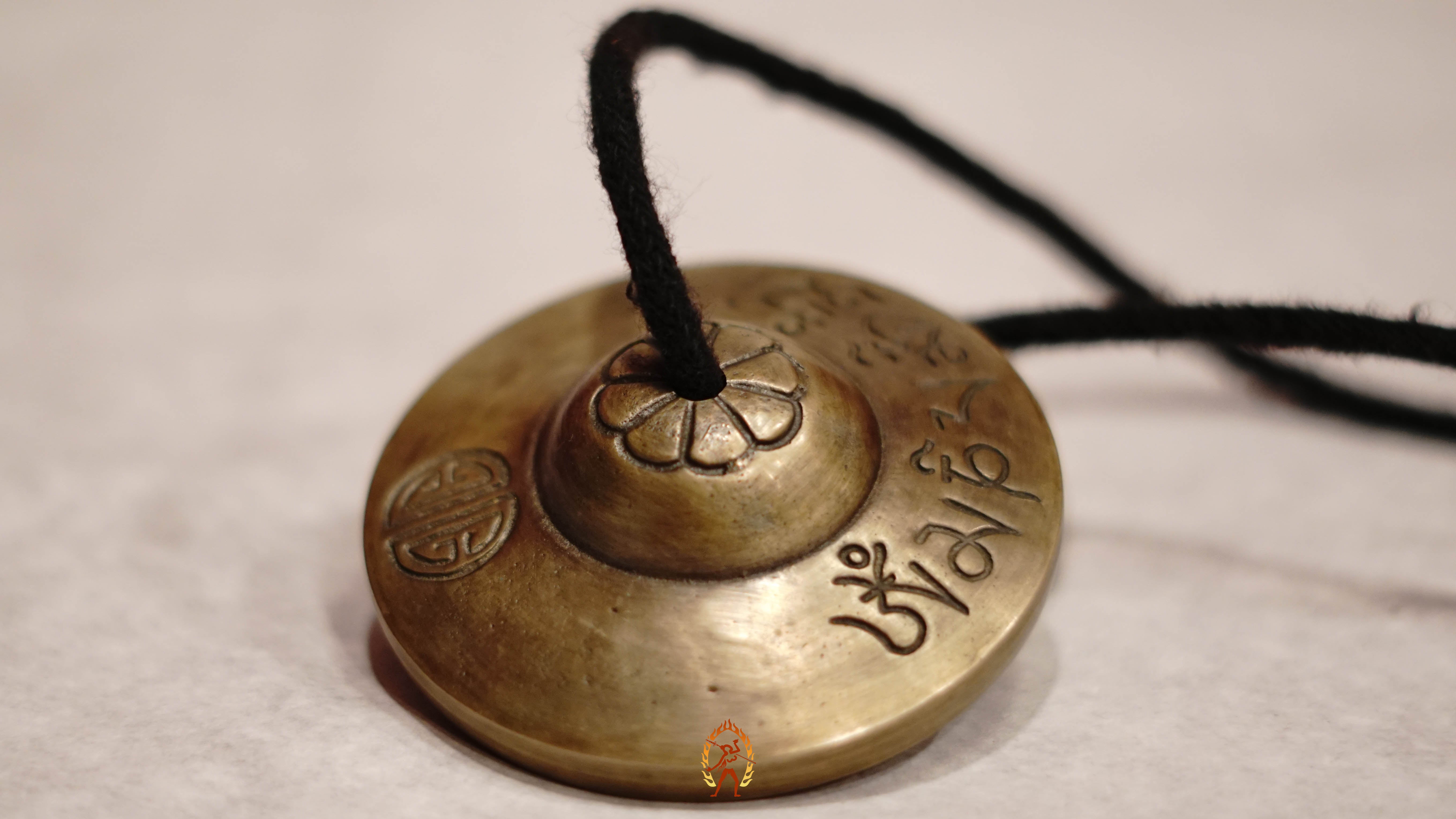 Traditional Tingsha Bell crafted in Nepal with a peaceful resonance to support your meditation and cleansing rituals.