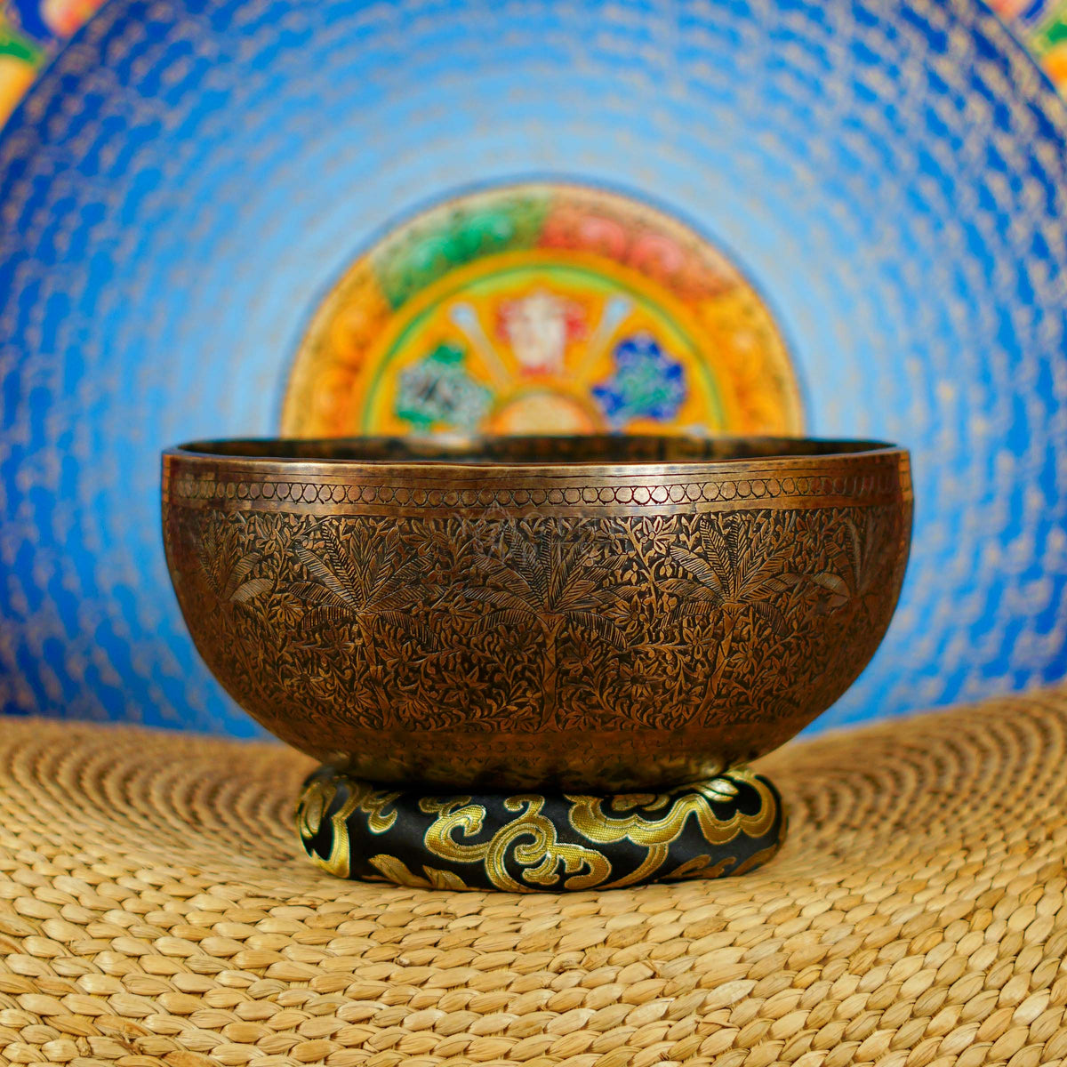 Semi antique Tibetan singing bowl with intricate floral and foliage engraving, handcrafted in Nepal