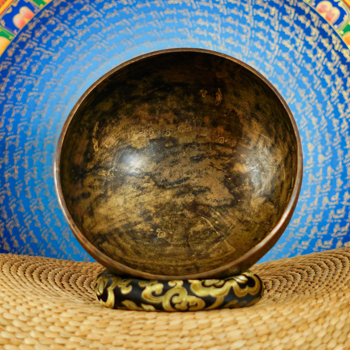 Semi antique Tibetan singing bowl with intricate floral and foliage engraving, handcrafted in Nepal
