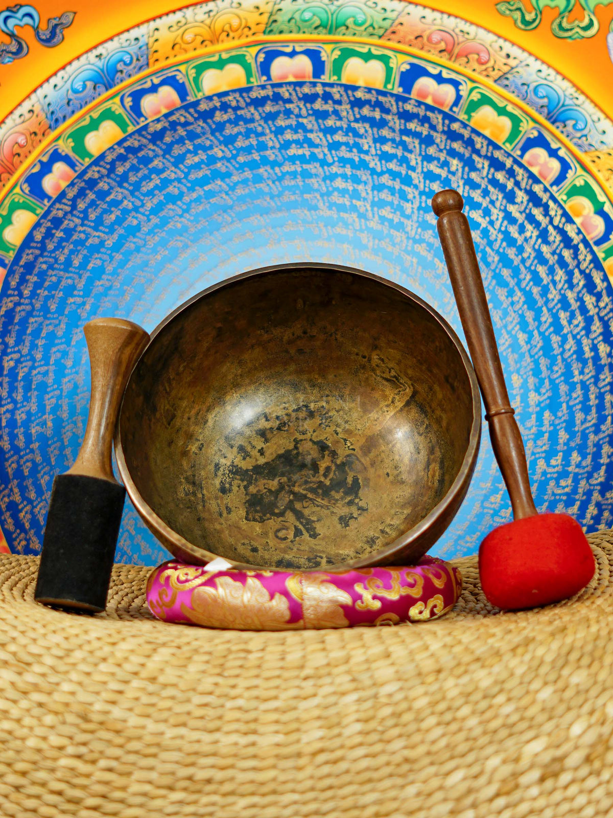 Semi antique singing bowl with intricate arch and floral engraved patterns in an aged bronze finish