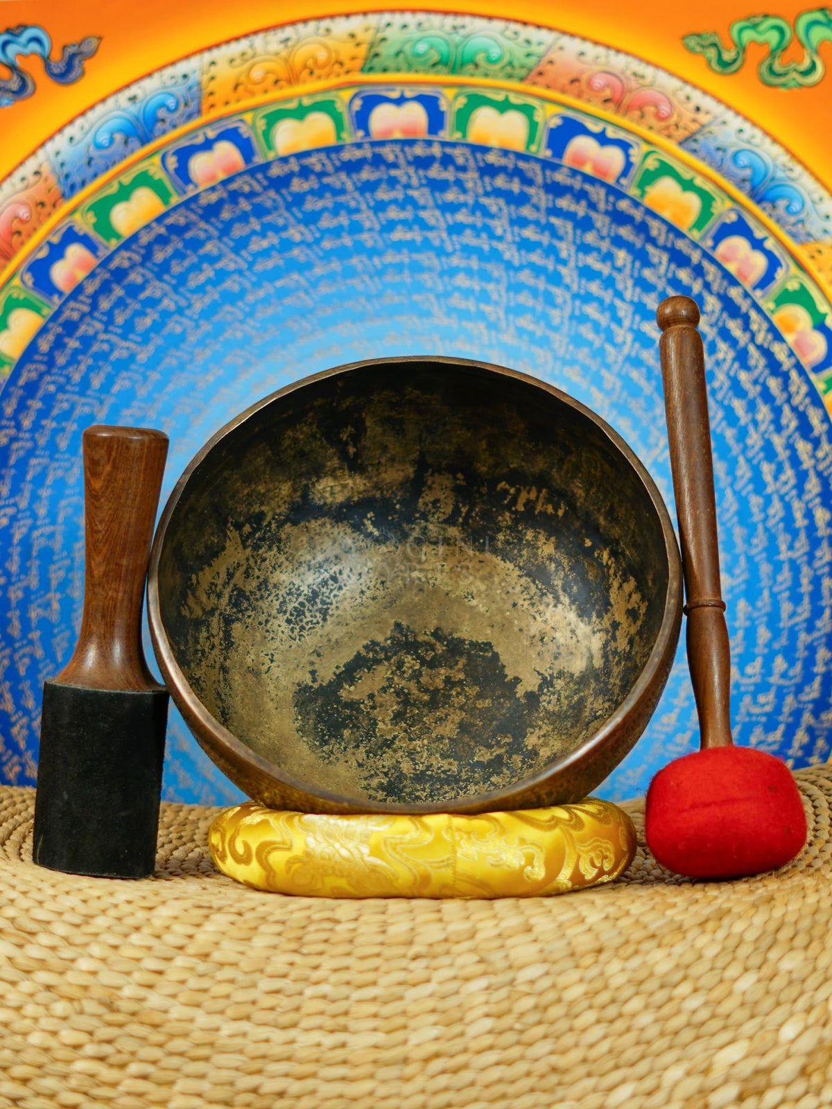 Semi antique handmade singing bowl with intricate flower vase engraving and floral patterns on aged bronze