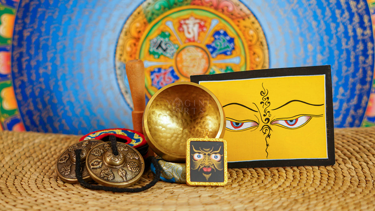 Buddhist meditation combination set featuring singing bowl, tingsha, Ghau Thangka and Eye Thangka artwork from Nepal