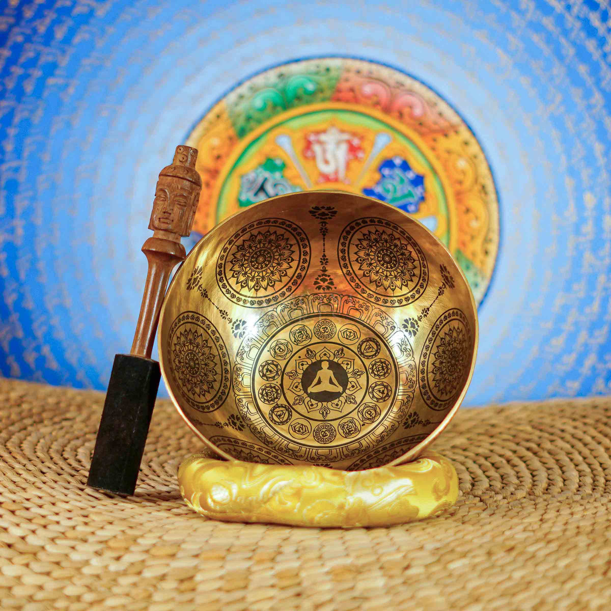 Chakra Mandala singing bowl with sacred geometry, meditation figure, and detailed engraved Buddhist-inspired artwork