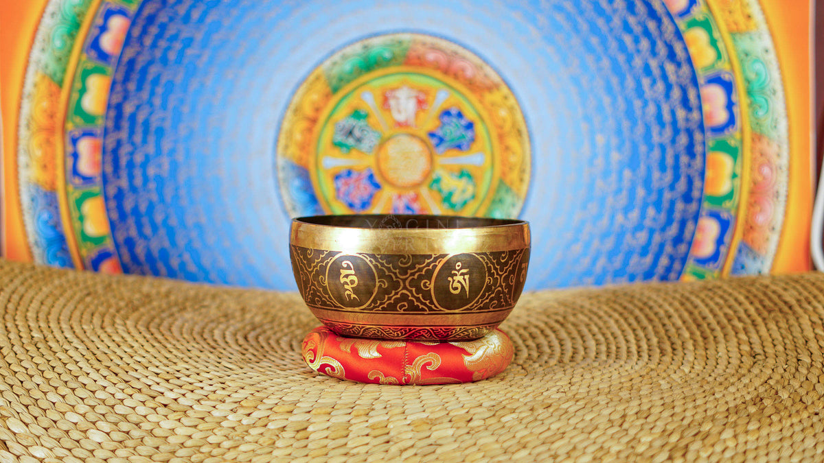 Conch singing bowl with traditional Buddhist conch symbolism and detailed engraved Nepalese craftsmanship