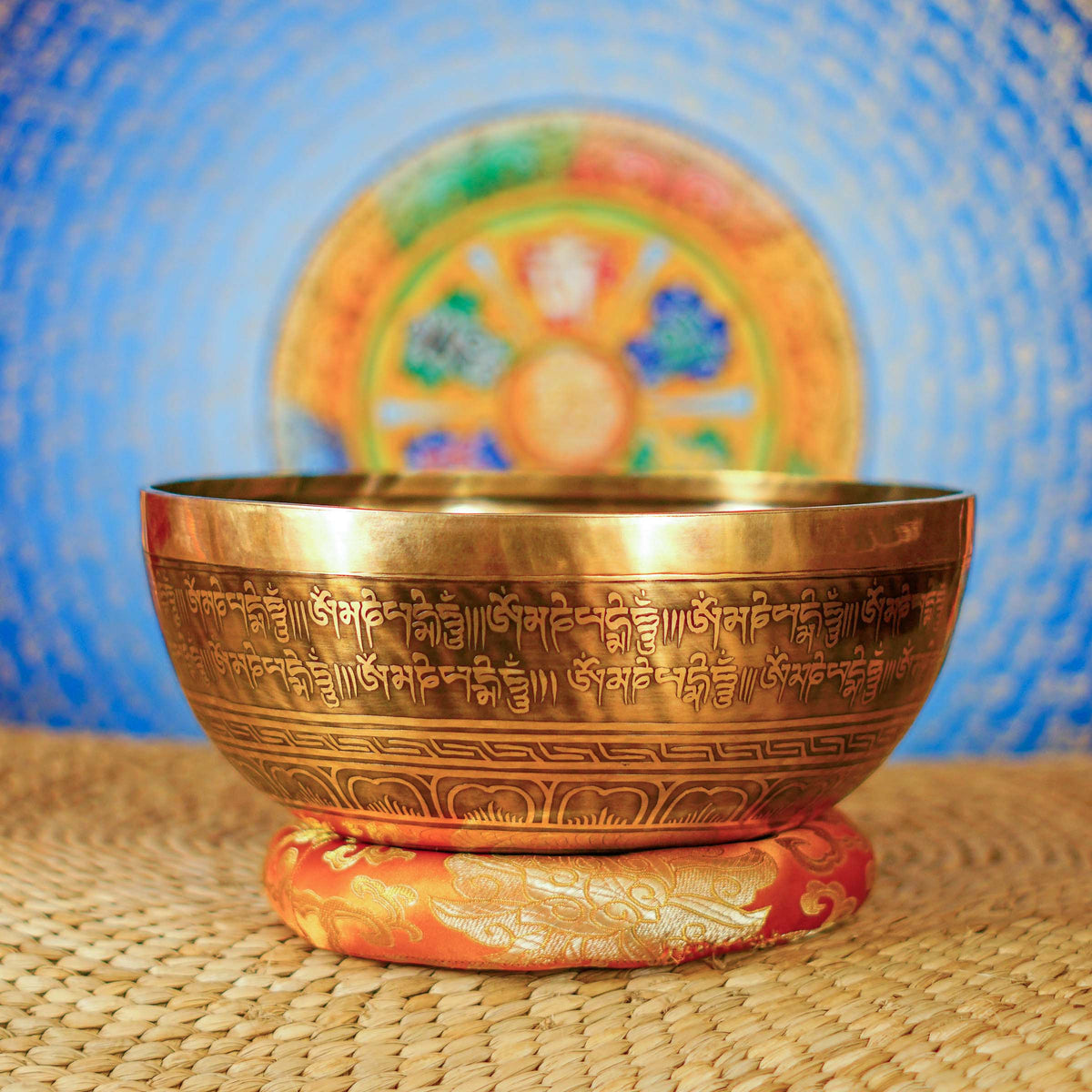 Handmade Nepal singing bowl with Shakyamuni Buddha carved on the outside, for meditation and sound healing