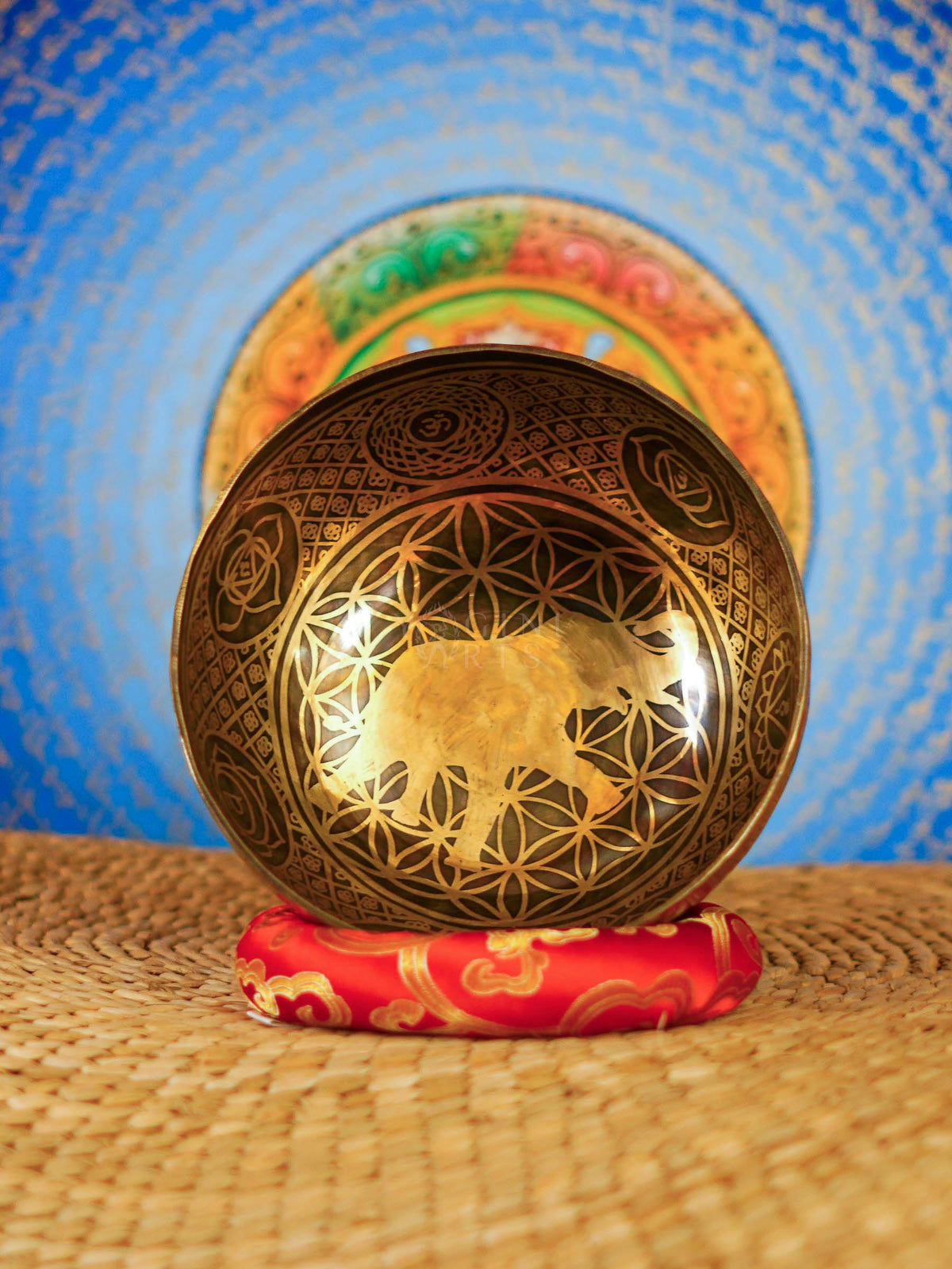 Elephant and Flower of Life engraved Nepalese singing bowl with cushion and mallet