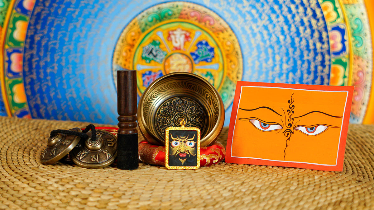 Auspicious singing bowl set with tingsha, suede mallet, cushion, Buddhist artwork and pendant