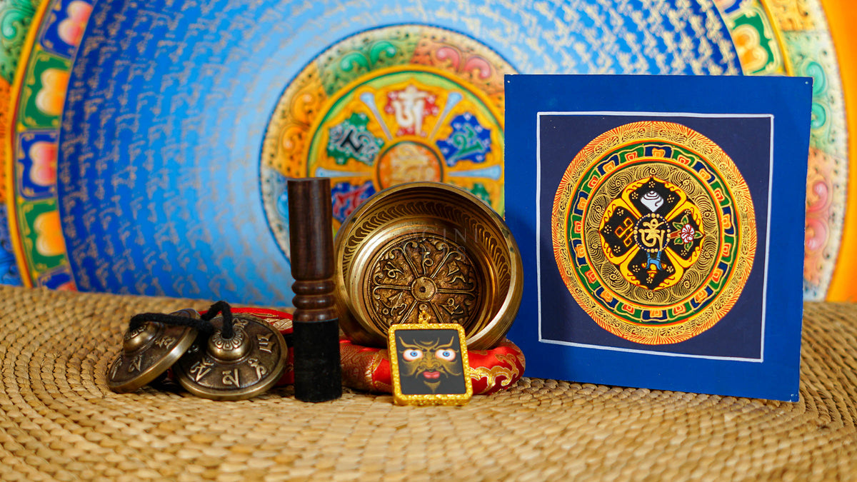 Mantra singing bowl set with tingsha, suede mallet, cushion, Buddhist artwork and pendant