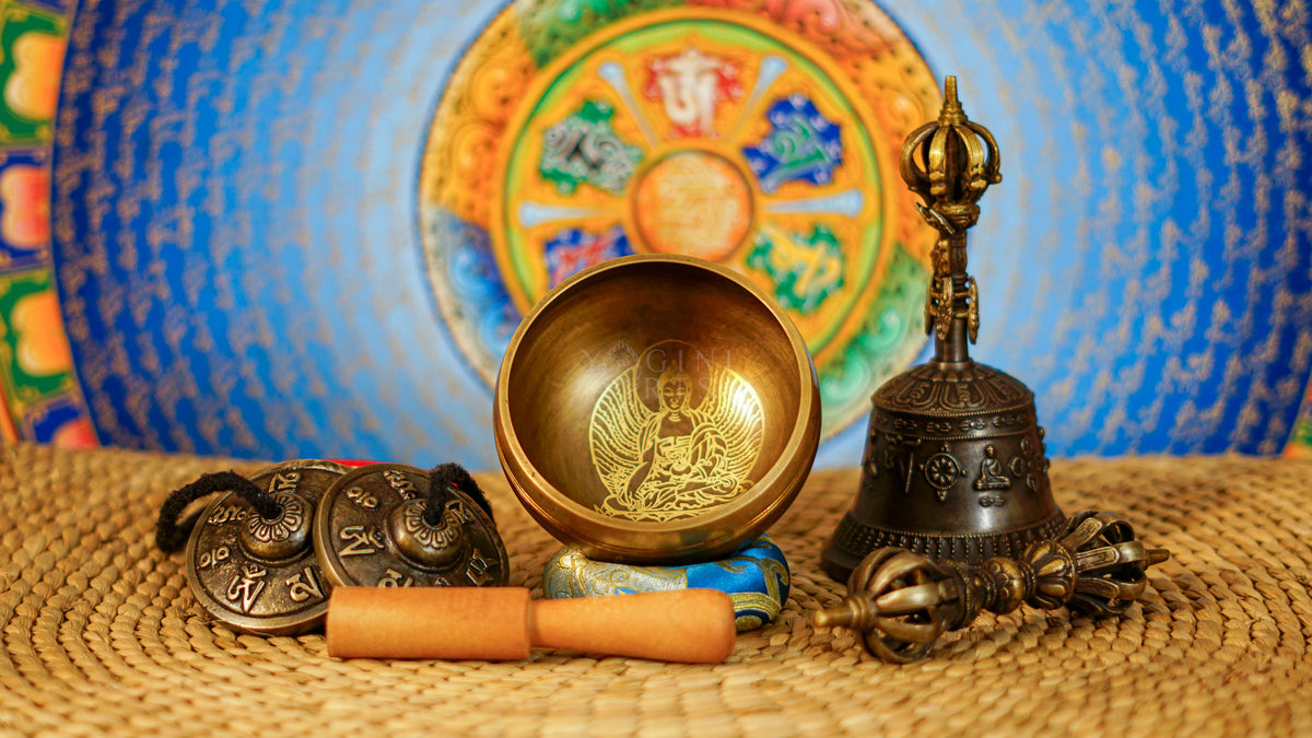 Complete Buddha singing bowl ritual set with Ashtamangala tingsha, Buddhist bell, vajra, wooden mallet and meditation accessories from Nepal