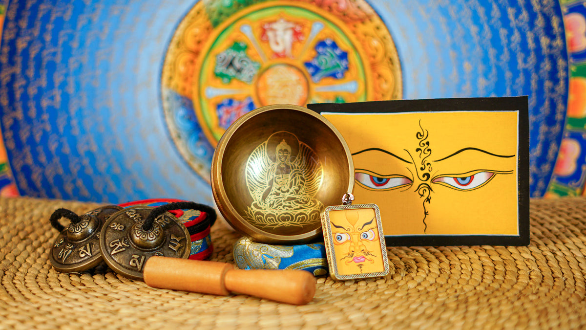 Buddha design singing bowl meditation set with Ashtamangala tingsha, wooden mallet, cushion and Buddhist devotional accessories from Nepal