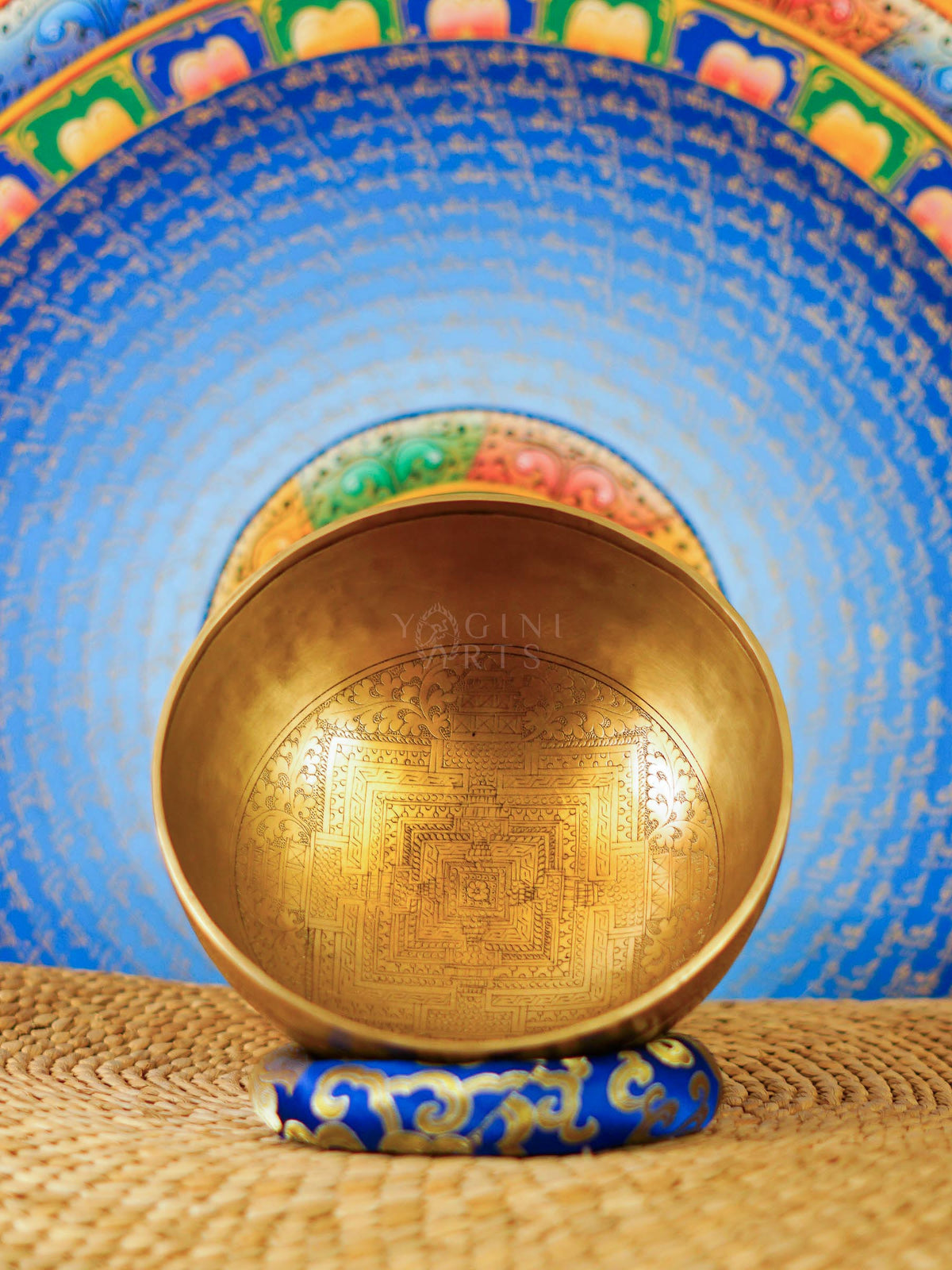 Handmade Kalchakra Mandala singing bowl from Nepal with detailed engraved mandala design and golden finish