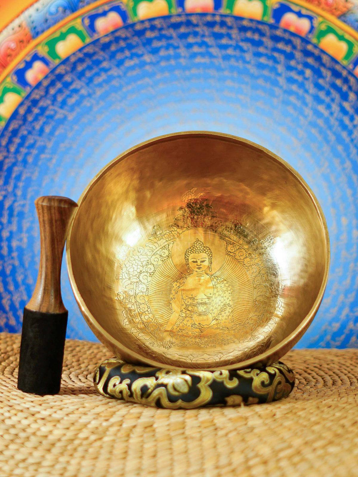 Handcrafted Buddha Singing Bowl from Nepal with engraved Buddha design for meditation and mindfulness