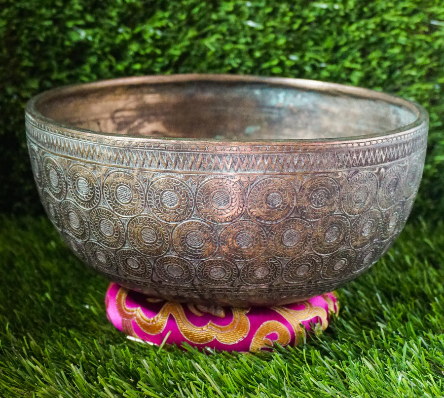 Handcrafted Semi-antique singing bowl made in Nepal with detailed carvings