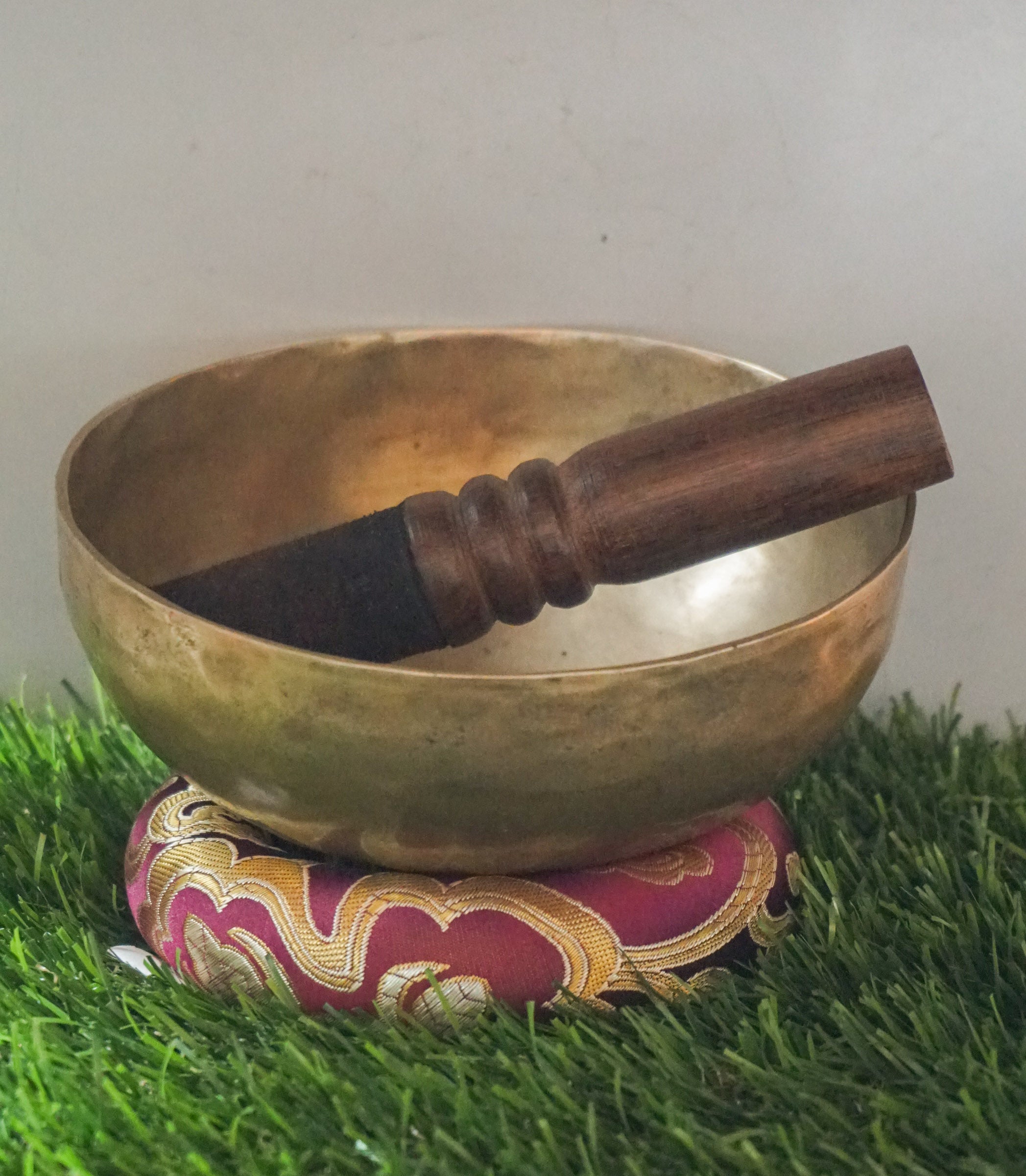 Semi-antique Singing Bowl handcrafted in Nepal with aged patina, producing deep resonant tones for meditation and healing.
