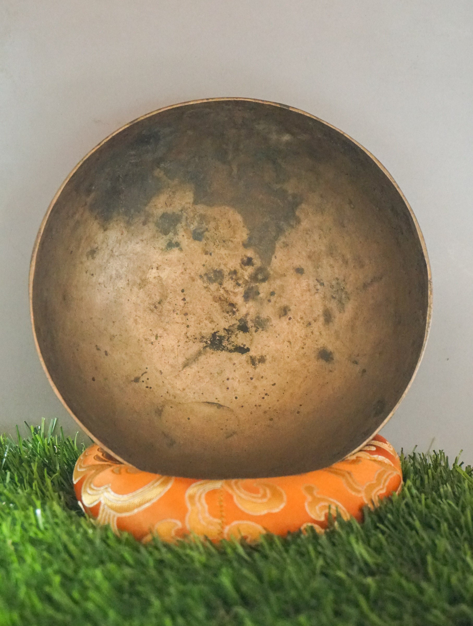 Semi-antique singing bowl handcrafted in Nepal with aged finish for meditation and healing.