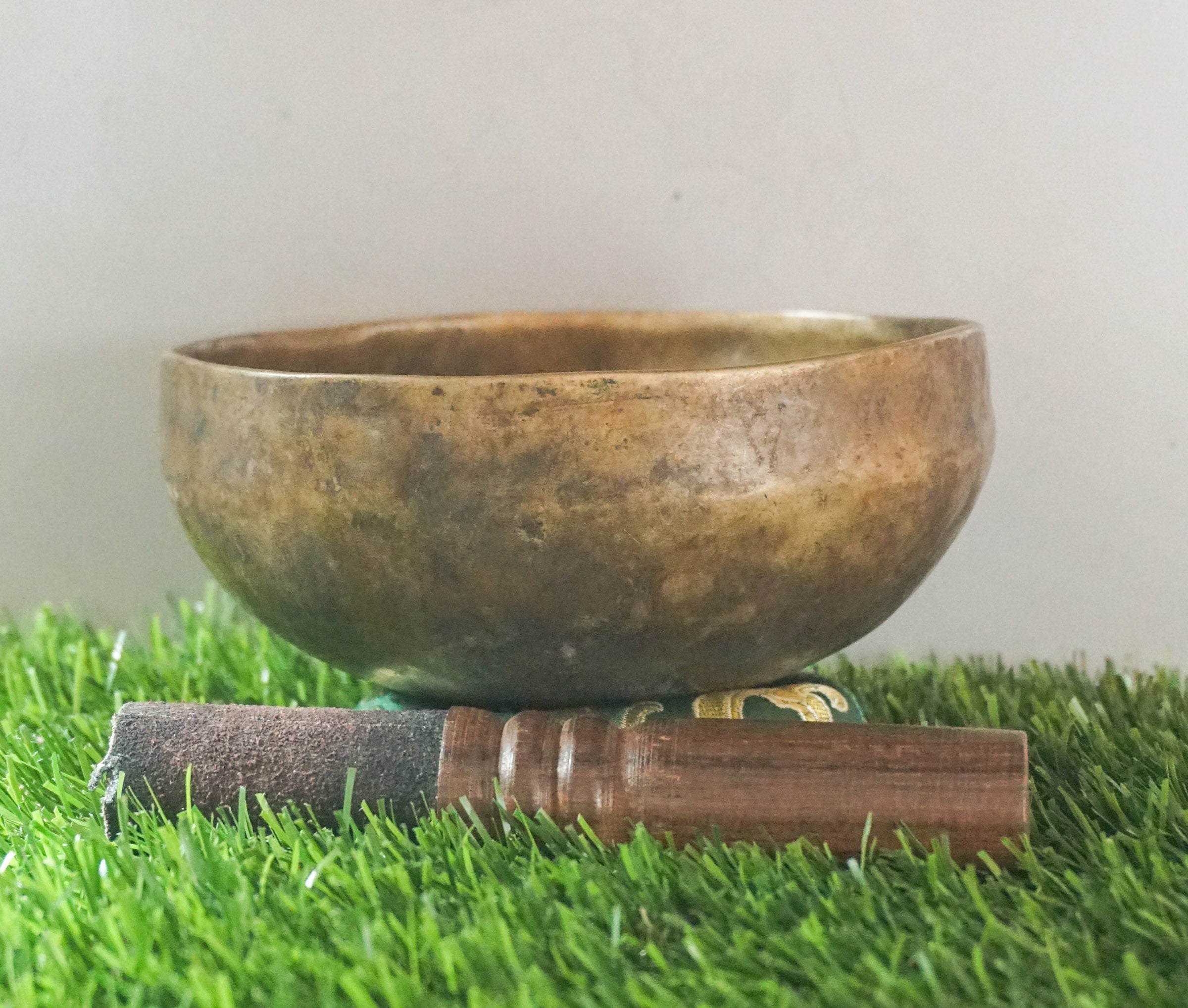 Semi-antique handmade Tibetan singing bowl with simple design, crafted in Nepal for meditation, Buddhist art, and sound healing.
