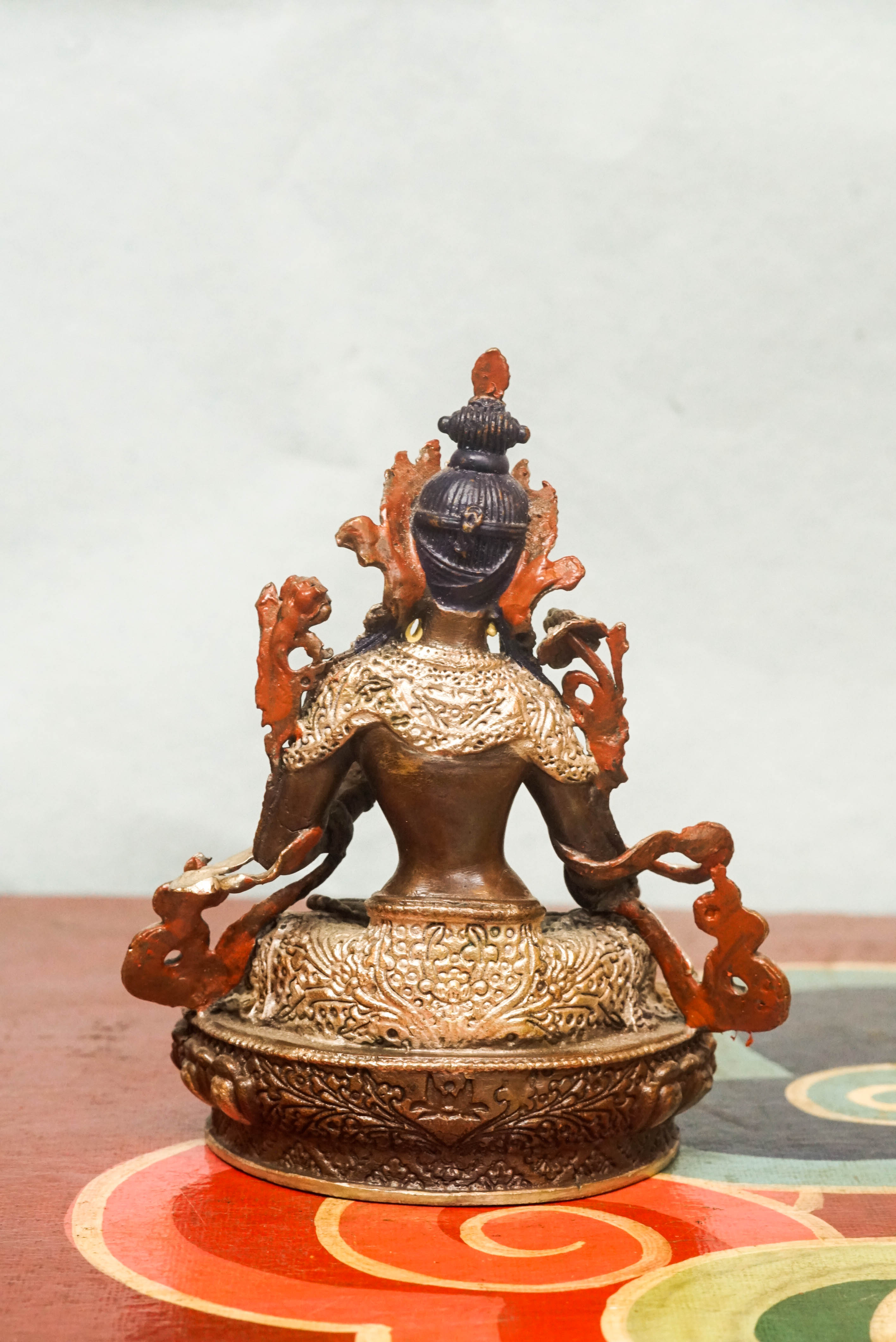 The silver-covered White Tara statue, she sits in serene lotus posture with seven eyes symbolizing watchful wisdom. A radiant symbol of peace and longevity, meditation, or as a meaningful spiritual gift.