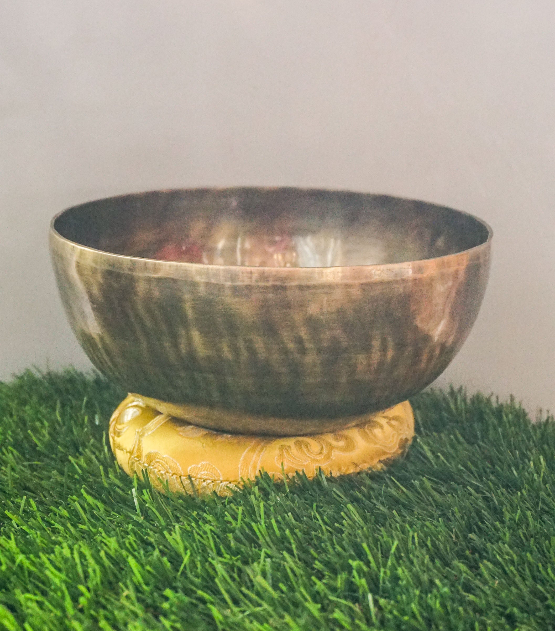 Hand-hammered Tiger Style Tibetan Singing Bowl from Kathmandu Nepal with tiger stripe patterns, used in Buddhist meditation, sound healing, and Himalayan mindfulness practice.