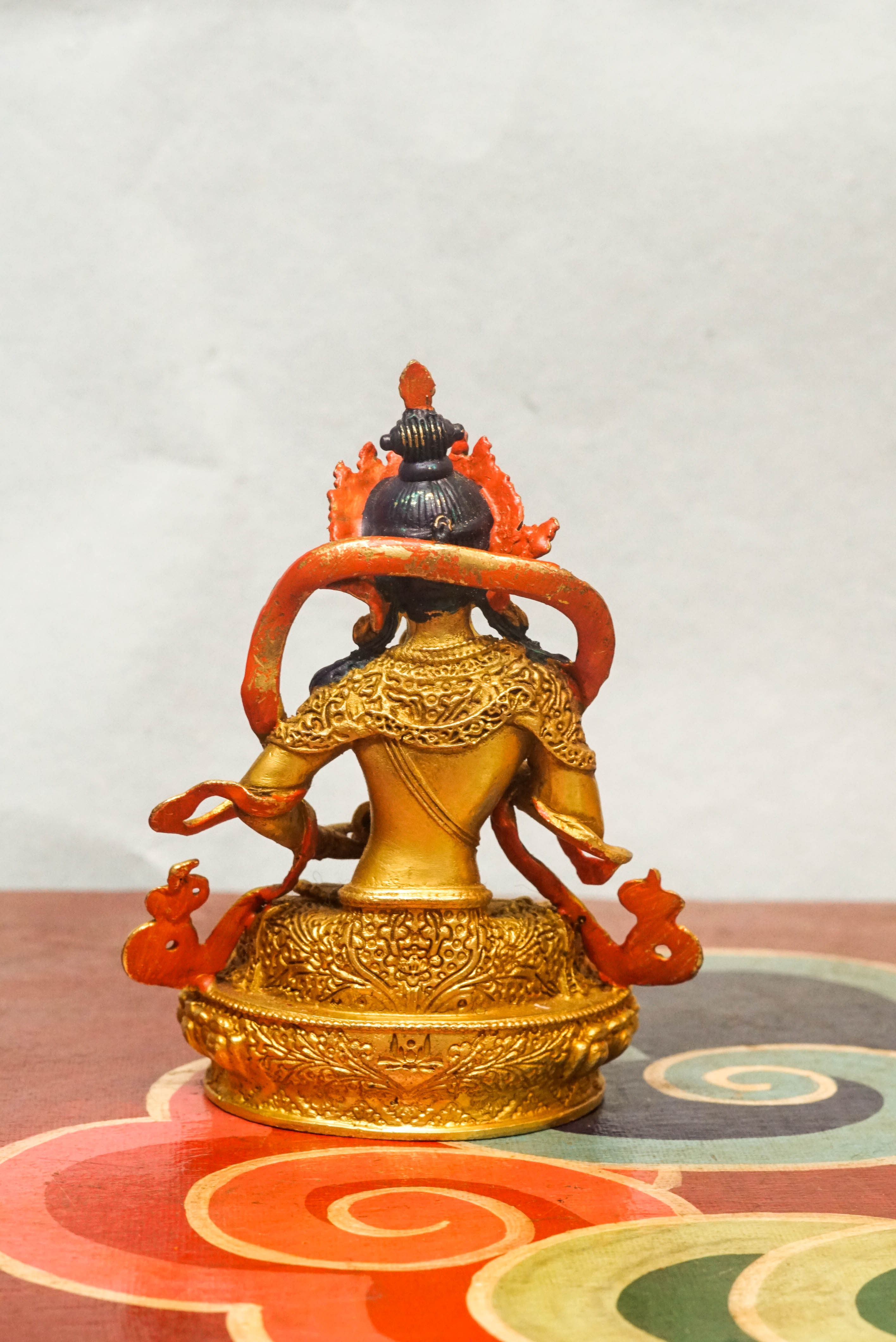 Invite purity and spiritual cleansing with this handcrafted Vajrasattva statue. Depicted in the diamond posture, holding a vajra and bell symbolizing wisdom and compassion. This statue inspires inner clarity and spiritual renewal.