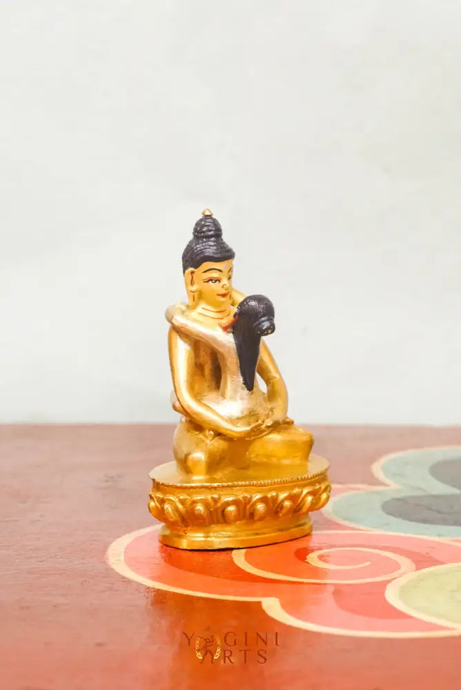 Statue of Buddha Shakti, depicting a serene Buddha figure in a meditative pose, adorned with symbolic ornaments and traditional attire.