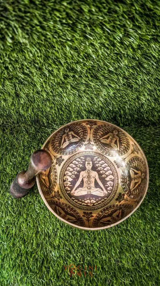 Awaken and balance your inner energies with our handcrafted Chakra Manab Singing Bowl. Featuring detailed engravings of the seven chakras and sacred Sanskrit mantras, this bowl supports spiritual growth, healing, and protection. Hand-hammered by skilled Himalayan artisans, it produces rich, clear tones that help clear energy blockages and promote chakra alignment. Ideal for meditation, sound healing, and holistic wellness, it is a meaningful companion on your spiritual journey.