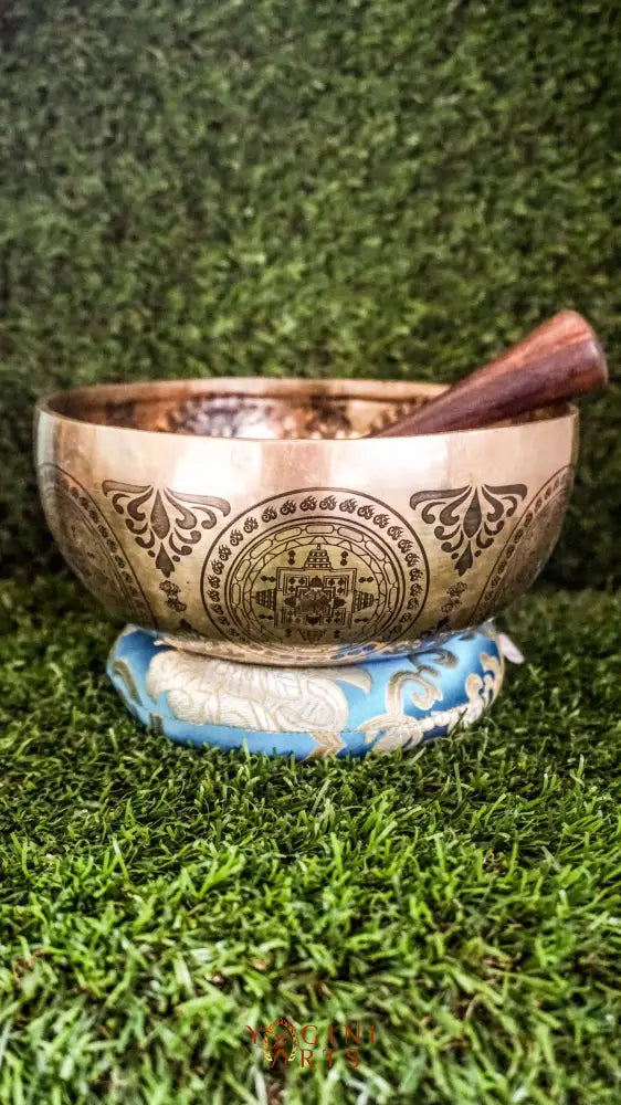 Awaken and balance your inner energies with our handcrafted Chakra Manab Singing Bowl. Featuring detailed engravings of the seven chakras and sacred Sanskrit mantras, this bowl supports spiritual growth, healing, and protection. Hand-hammered by skilled Himalayan artisans, it produces rich, clear tones that help clear energy blockages and promote chakra alignment. Ideal for meditation, sound healing, and holistic wellness, it is a meaningful companion on your spiritual journey.