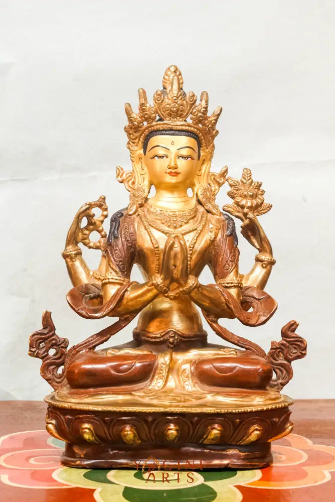 Chenrezig statue depicts the Bodhisattva of Compassion in four-armed form seated on a lotus pedestal. Ideal for meditation altars or spiritual decor, it inspires mindfulness, healing, and heartfelt compassion in any space.