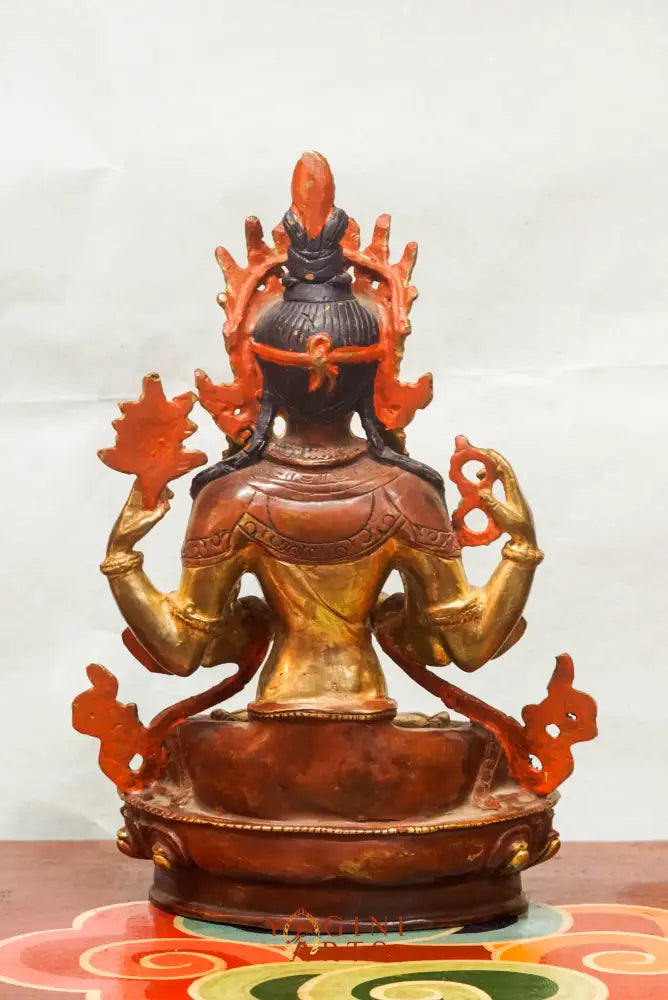 Chenrezig statue depicts the Bodhisattva of Compassion in four-armed form seated on a lotus pedestal. Ideal for meditation altars or spiritual decor, it inspires mindfulness, healing, and heartfelt compassion in any space.