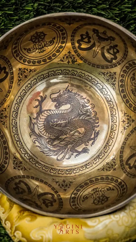 Awaken strength and clarity with our handcrafted Dragon Singing Bowl. The engraved dragon symbolizes protection and transformation. It produces deep, calming tones that ground your energy and boost focus. Sacred mantras on the outside offer spiritual protection. Perfect for meditation and healing, this bowl supports emotional balance and personal growth.