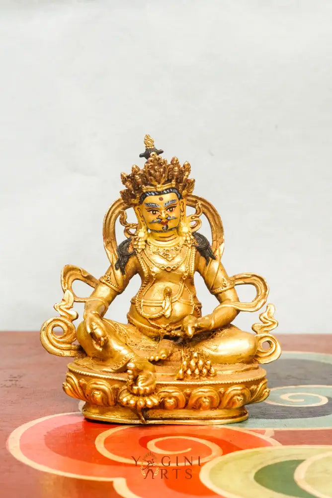 Gold-plated Zambala statue, the Buddhist deity of wealth and prosperity. A symbol of good fortune and generosity.