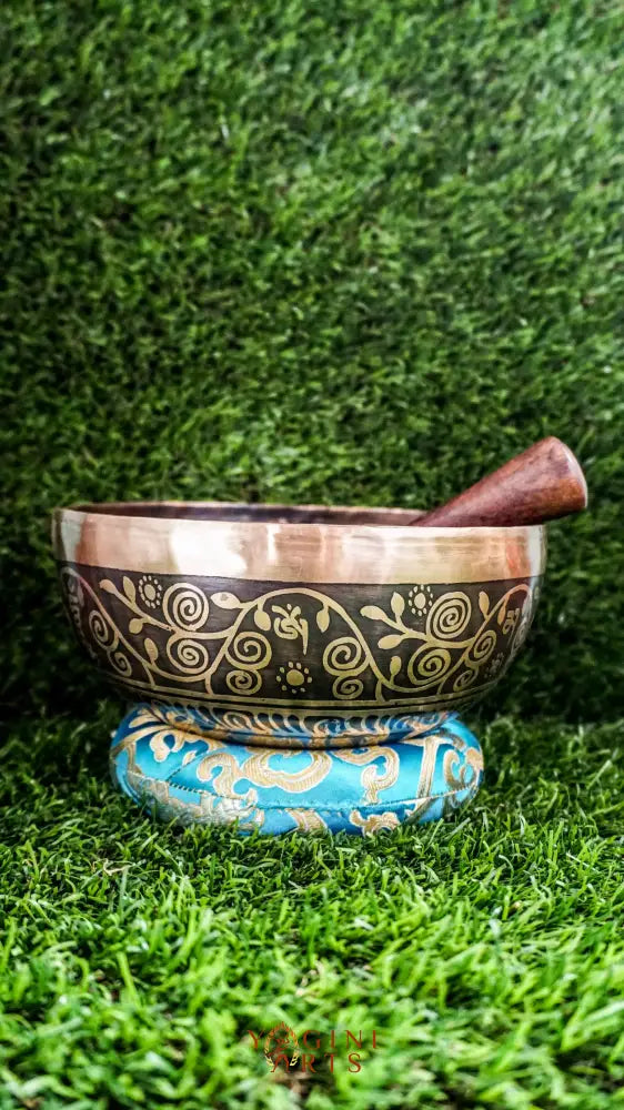 The Elephant Singing Bowl features a wise elephant symbol and floral patterns with the Om Mani Padme Hum chant. It produces a deep, grounding tone that brings calm, strength, and focus. Perfect for meditation and reflection. Includes wooden mallet and silk cushion.