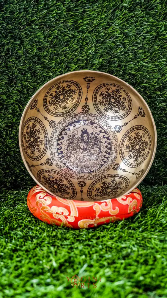 The Green Tara Singing Bowl brings compassion and protection to your space. Featuring Green Tara at its center and surrounded by calming mandala patterns, it produces a soft, steady sound that helps soothe the mind and deepen meditation. A gentle companion for peace and healing.