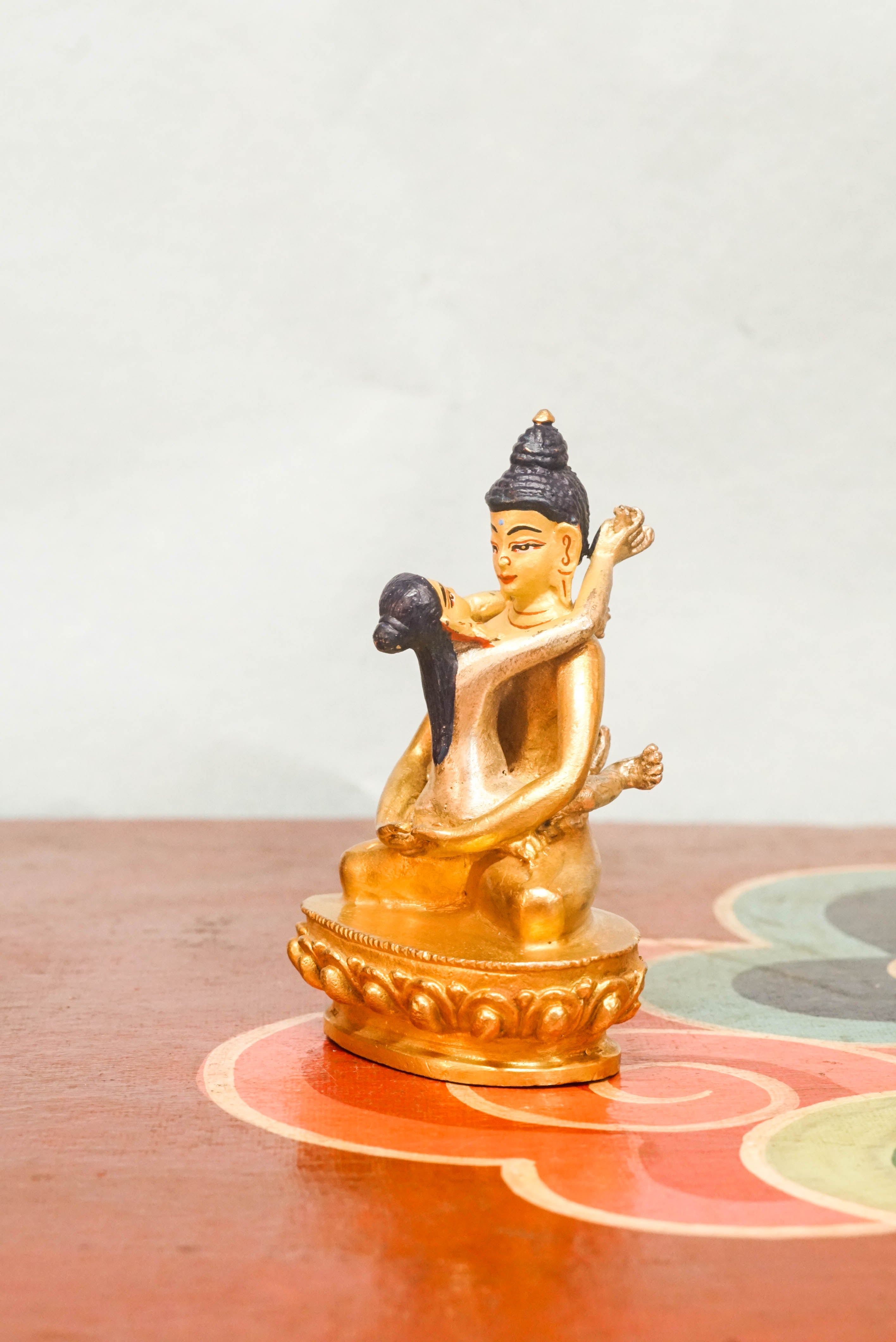 Statue of Buddha Shakti, depicting a serene Buddha figure in a meditative pose, adorned with symbolic ornaments and traditional attire.
