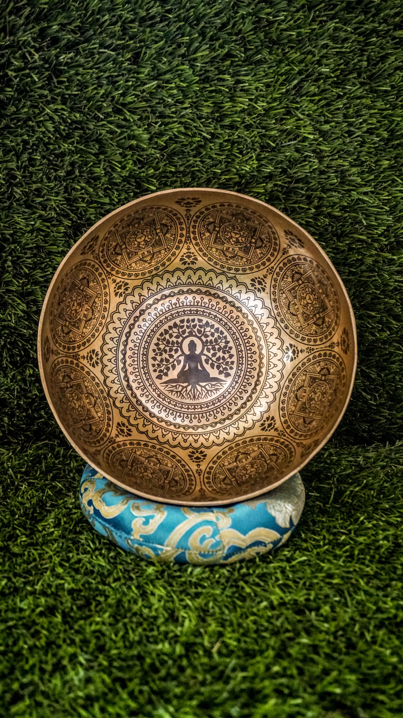 Connect to peace and clarity with our handcrafted Buddha Tree Singing Bowl. At its heart is an engraved Bodhi tree, a symbol of enlightenment and inner growth. Surrounding it, sacred Sanskrit mantras radiate healing and protection. Hand-hammered by Himalayan artisans, this bowl produces rich calming tones that support meditation, mindfulness, and emotional balance. It is a powerful companion for spiritual practice, healing rituals, or creating a serene space in your home.