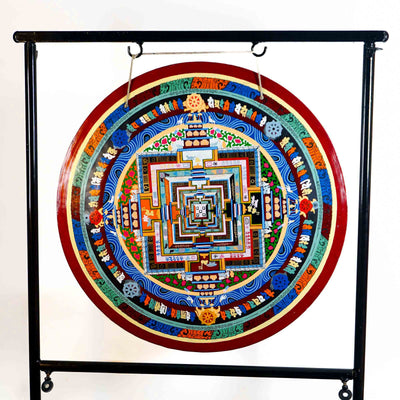 Kalachakra Mandala gong featuring colorful sacred geometry, Tibetan script, Buddhist symbols, and traditional Nepalese artwork