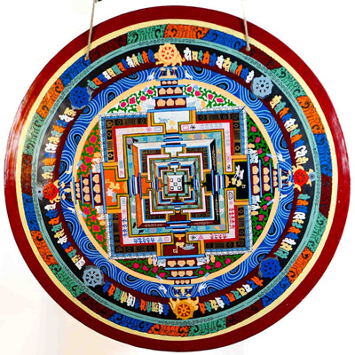 Kalachakra Mandala gong featuring colorful sacred geometry, Tibetan script, Buddhist symbols, and traditional Nepalese artwork