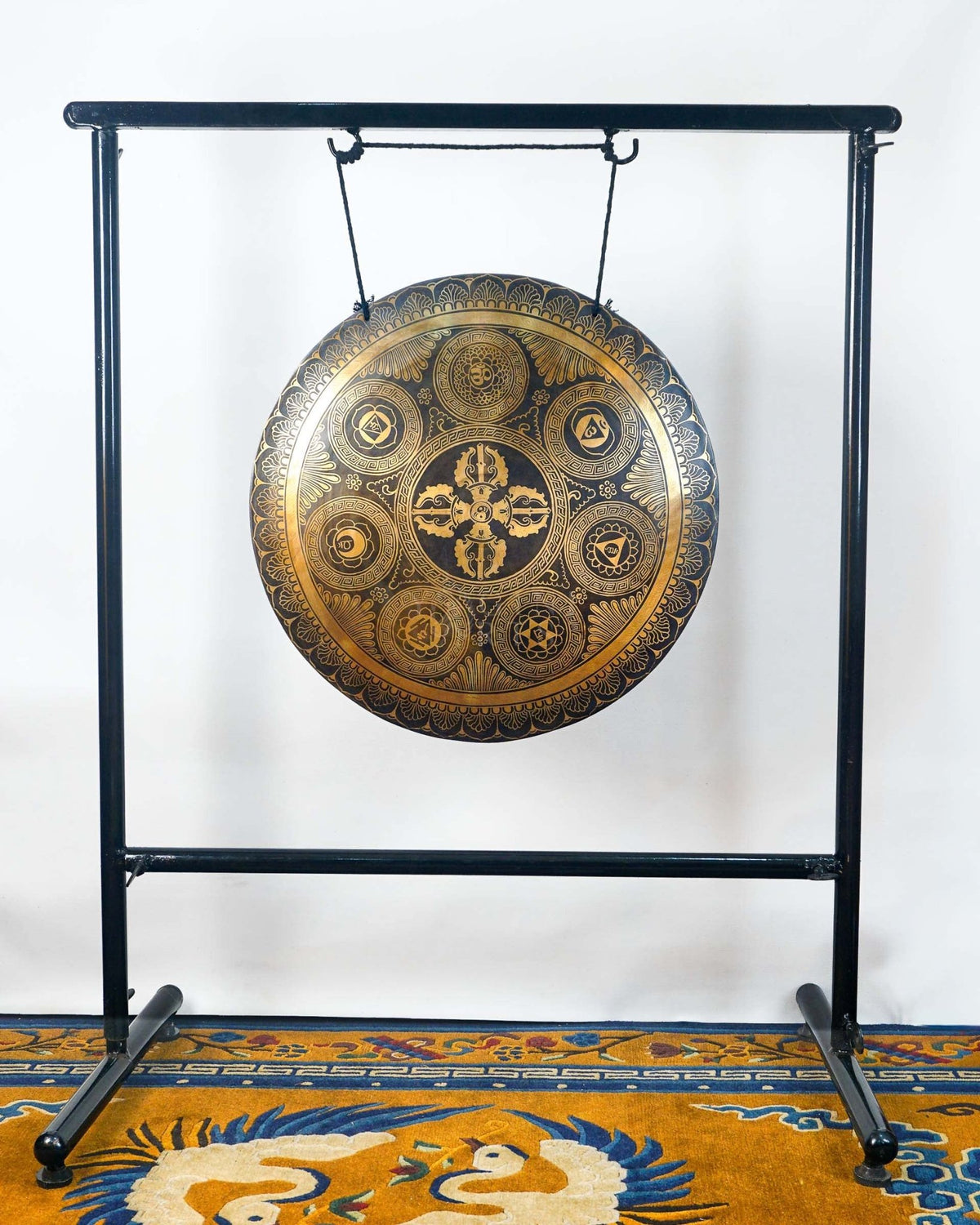 Ashtamangala gong featuring the Eight Auspicious Symbols with detailed golden Buddhist artwork and traditional Nepalese craftsmanship