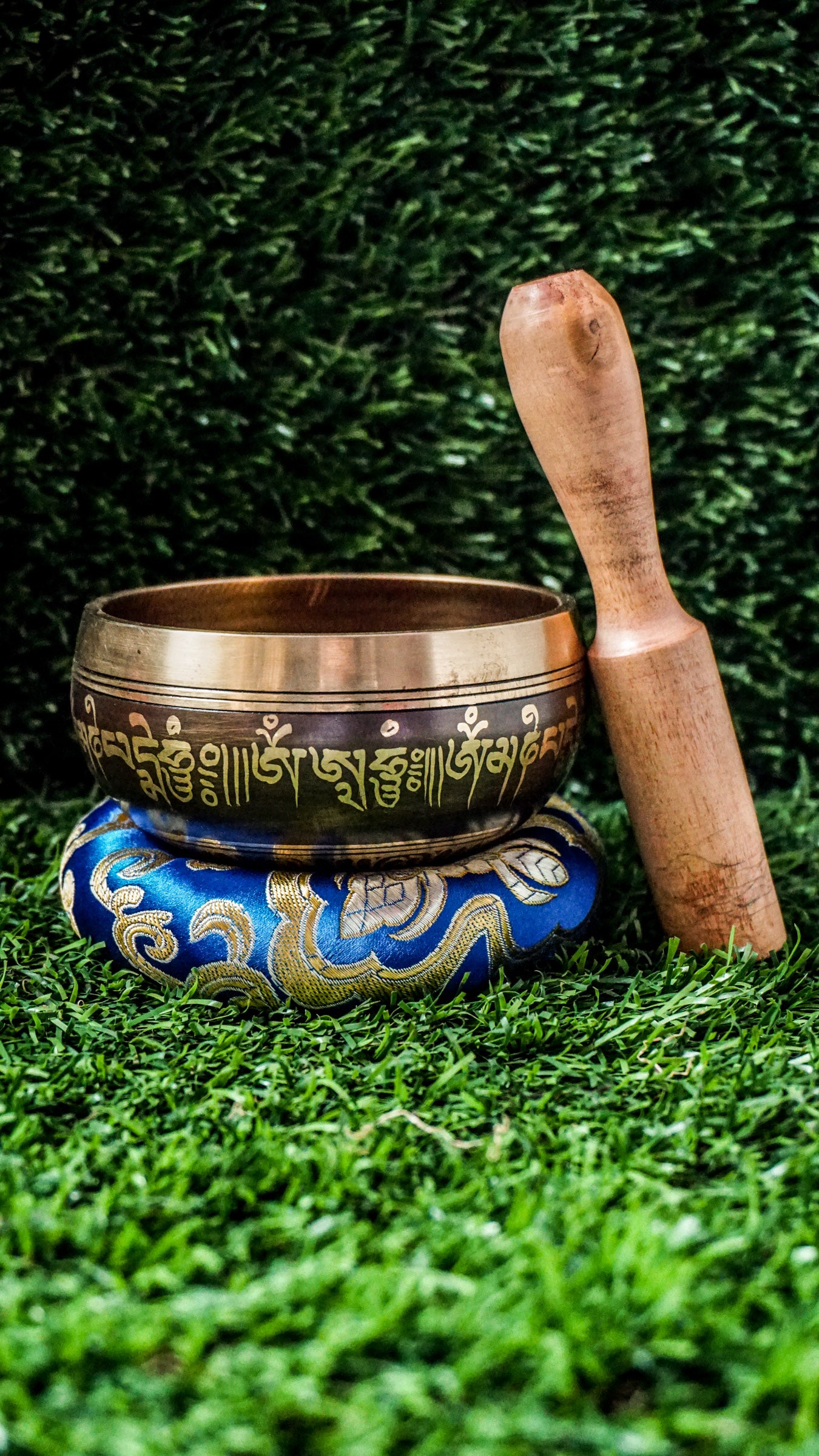 The Double Dorje Singing Bowl grounds and centers your energy. At its heart is the double dorje symbol, representing protection, balance, and spiritual strength. The outside is wrapped with the Om Mani Padme Hum mantra, adding compassion and focus. It produces deep, steady tones perfect for grounding meditation or creating calm. Includes singing bowl, wooden mallet, and silk cushion. Wipe clean and store dry. Let this bowl be your anchor for stillness and strength.
