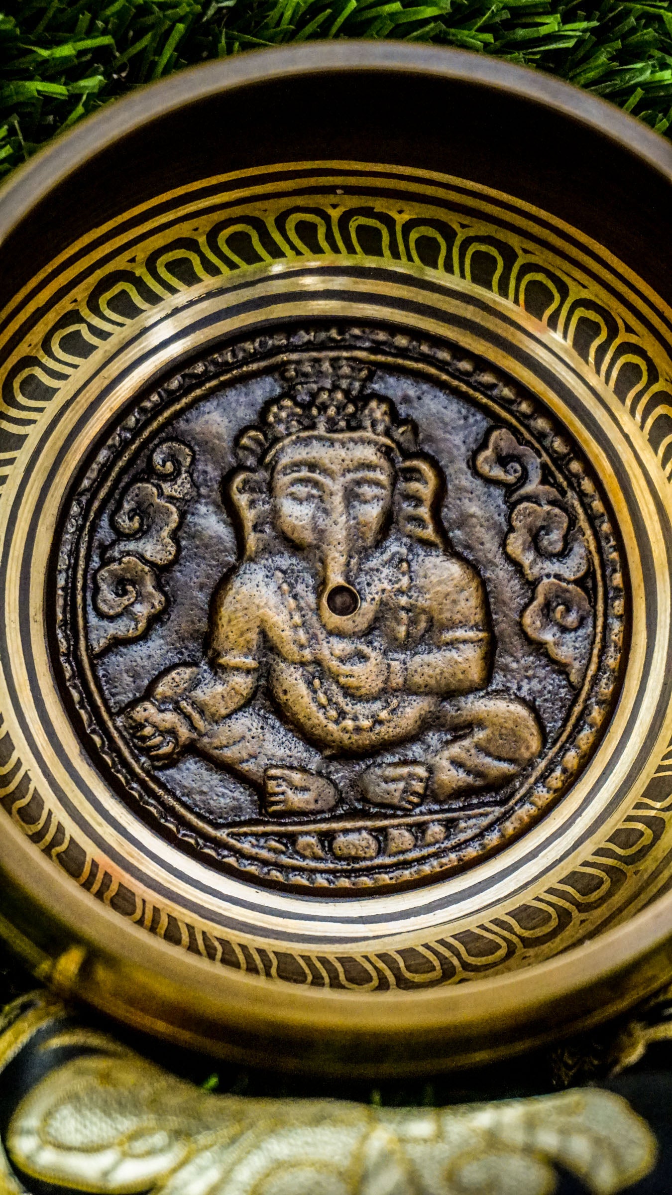 
The Ganesh Singing Bowl carries the energy of new beginnings and wisdom. With Lord Ganesh carved at its center, it symbolizes success, protection, and clarity. Simple outer patterns keep the focus on this sacred figure. Its smooth, grounding tone calms the mind and supports meditation or intention setting, making it a meaningful companion for strength and mindful energy.