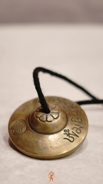 Traditional Tingsha Bell crafted in Nepal with a peaceful resonance to support your meditation and cleansing rituals.
