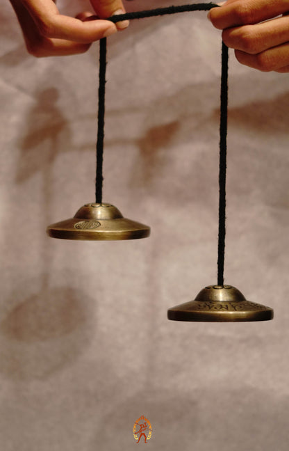 Traditional Tingsha Bell crafted in Nepal with a peaceful resonance to support your meditation and cleansing rituals.