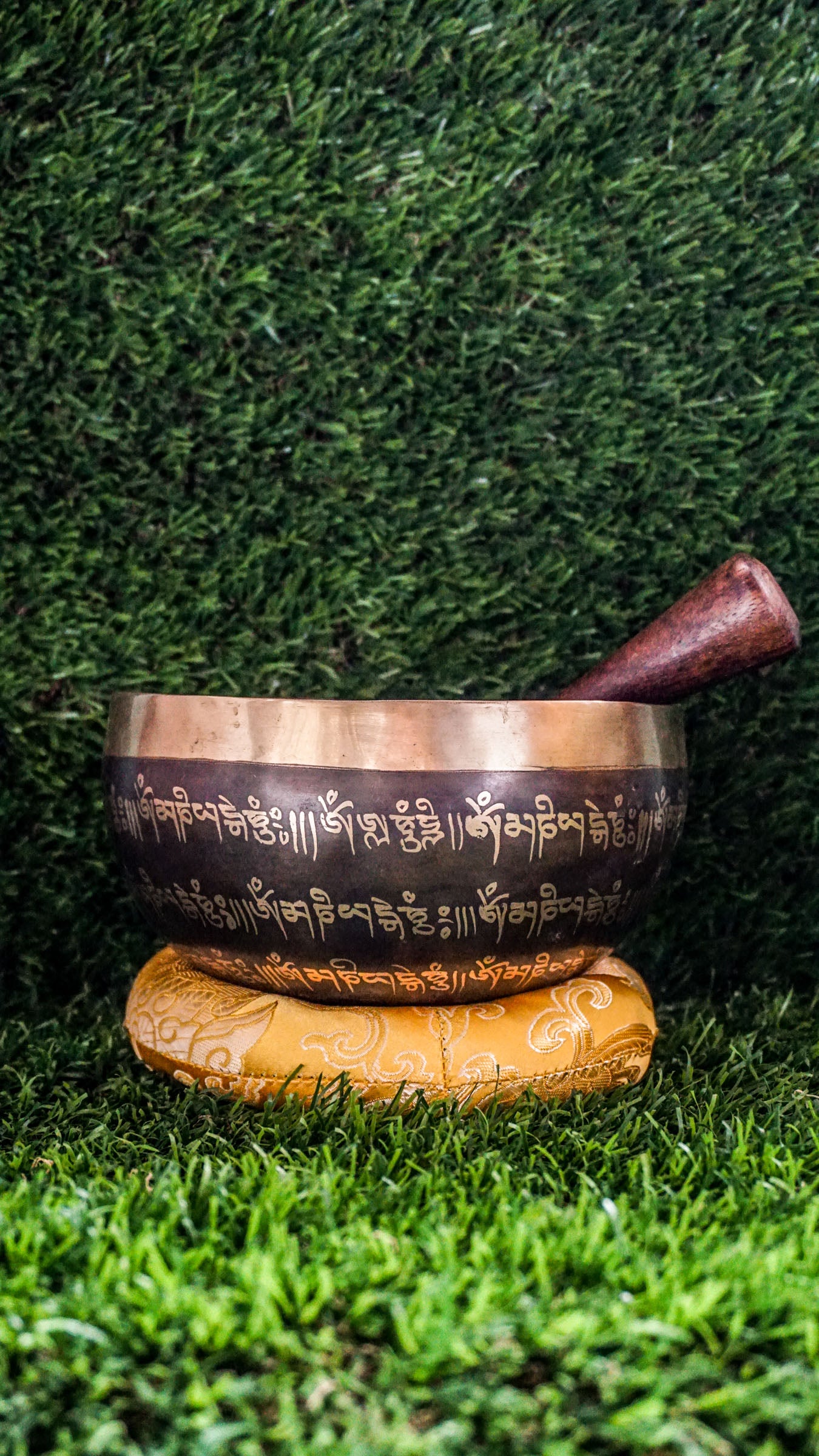 The Om Mantra Singing Bowl features the Tibetan Om symbol at its center, surrounded by the sacred Om Mani Padme Hum mantra in a flowing circular design. This same mantra continues around the outside, wrapping the bowl in peaceful energy. Its soft tone and smooth finish make it perfect for meditation, reflection, or creating a calm space.