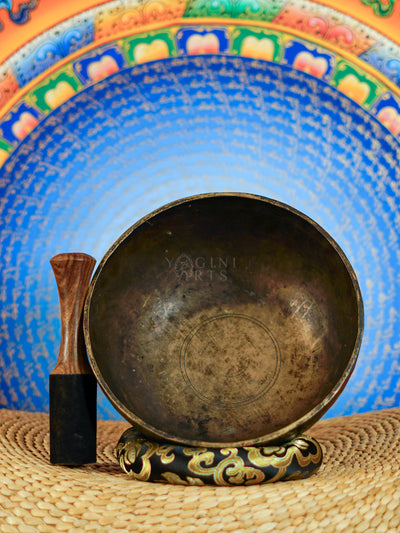 Semi antique Tibetan singing bowl with dark aged patina, handmade in Nepal for meditation and sound practice