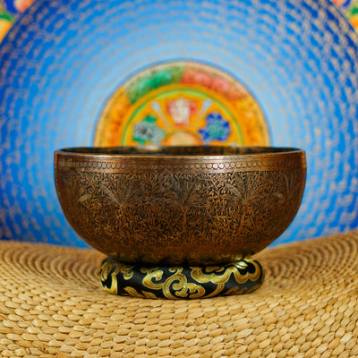 Semi antique Tibetan singing bowl with intricate floral and foliage engraving, handcrafted in Nepal