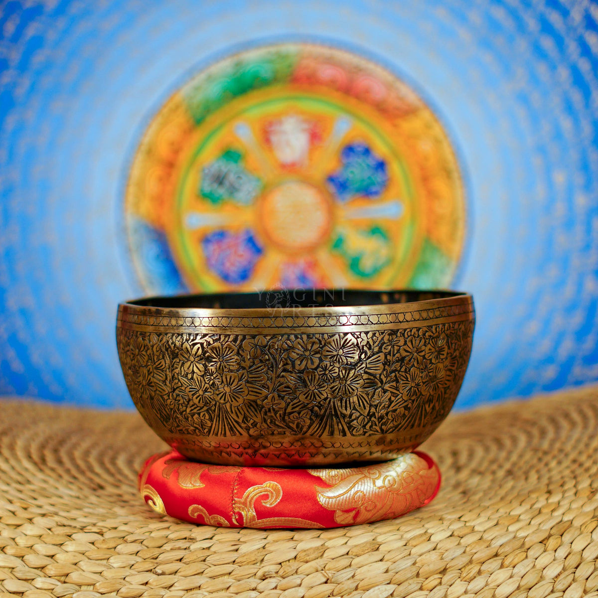 Semi antique Tibetan singing bowl with detailed floral and foliage engraving, handcrafted in Nepal