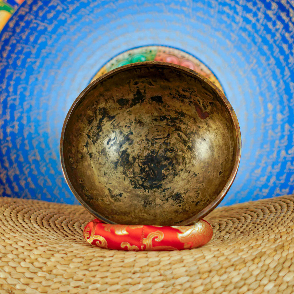 Semi antique floral engraved Tibetan singing bowl handcrafted in Nepal with detailed flower and foliage design