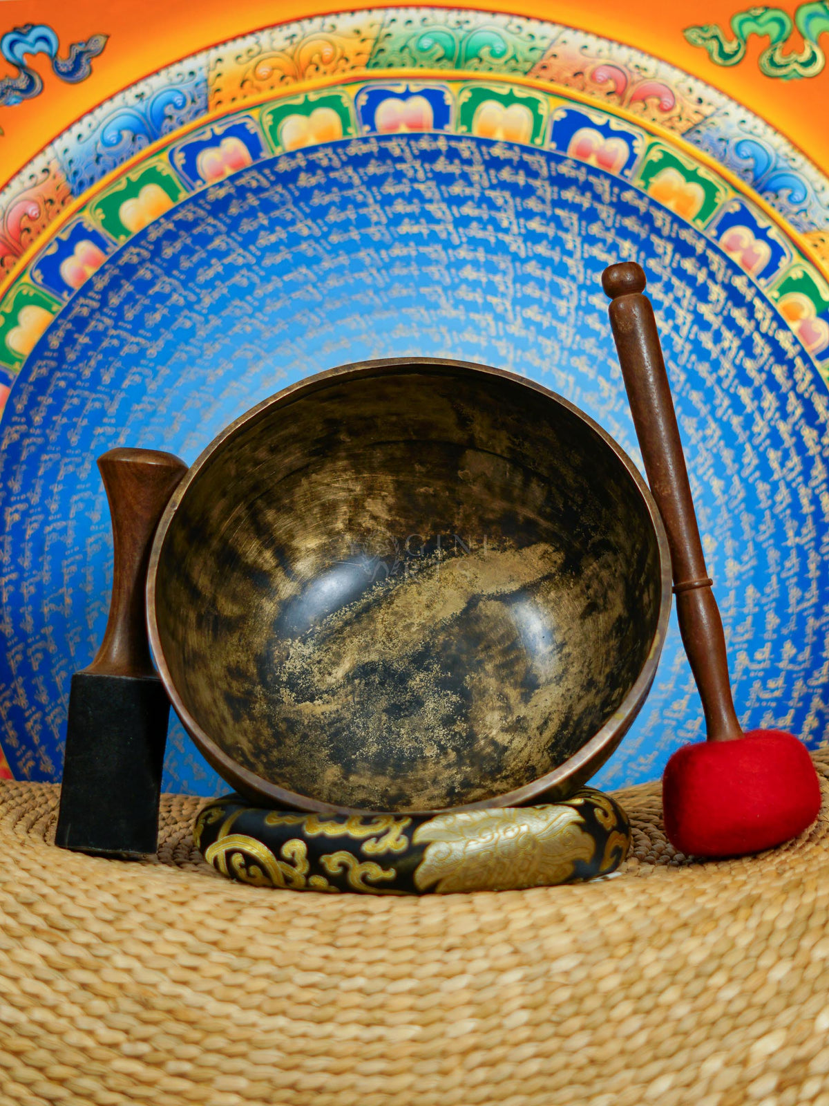 Semi antique singing bowl with intricate floral and leaf engraving, traditional Himalayan design